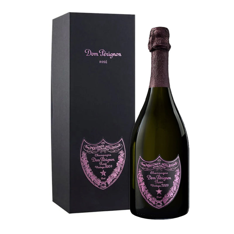 Bottiglia di champagne Dom Pérignon Rosé vintage 2009 con etichetta rosa su vetro scuro e confezione nero opaco verticale con scritte rosa.