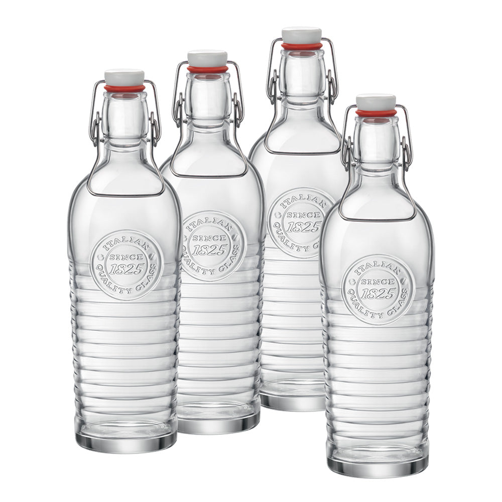 Quattro bottiglie di vetro trasparente con chiusura ermetica a leva, superficie a righe orizzontali e scritta in rilievo "Italian Quality Glass Since