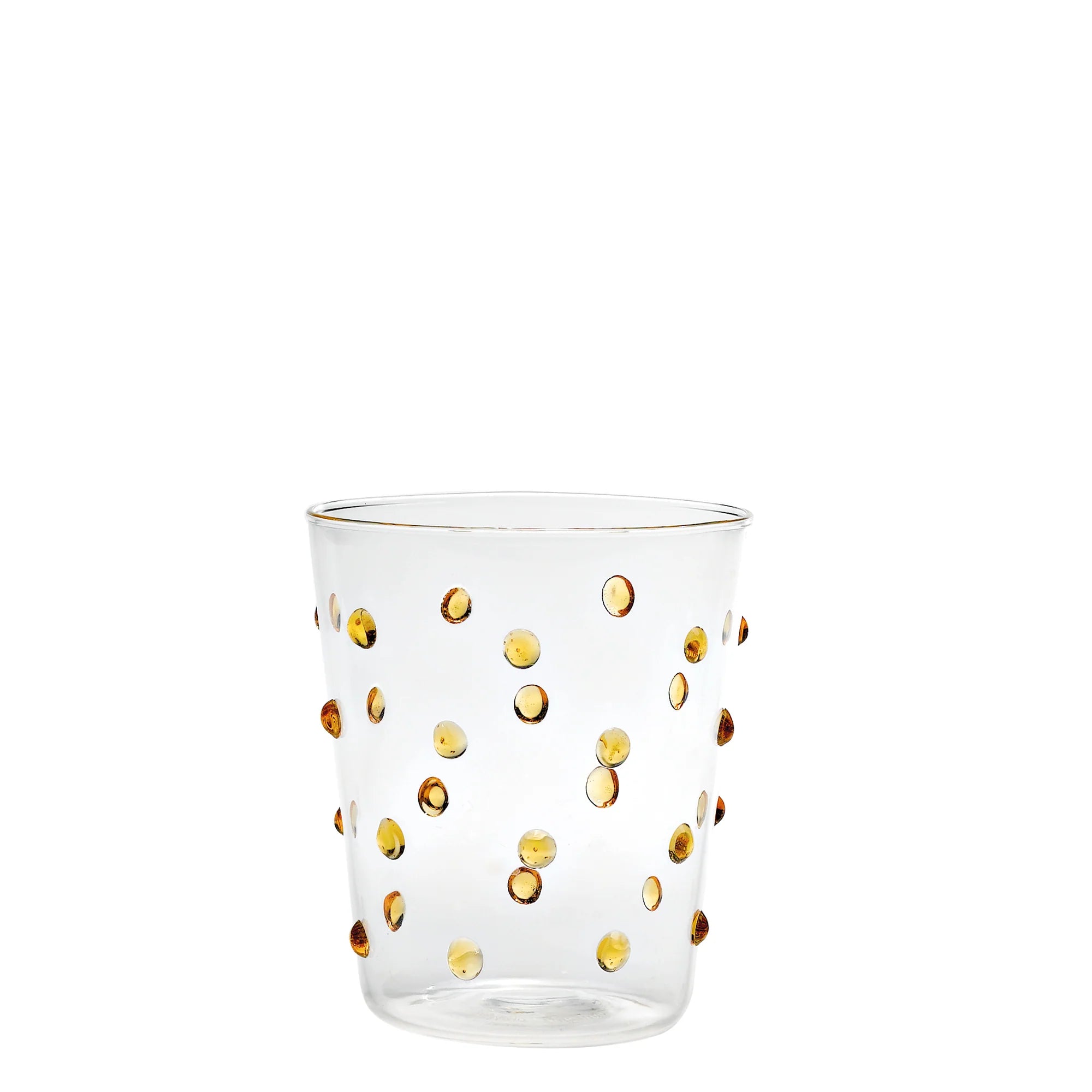 Bicchiere trasparente in vetro con decorazioni a rilievo a pois gialli e bordo dorato su sfondo bianco.