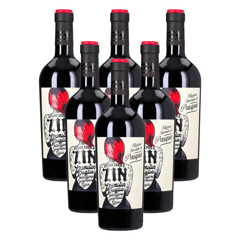Sei bottiglie di vino rosso con etichetta decorata da disegno di donna con capelli rossi e scritte in nero su sfondo bianco.