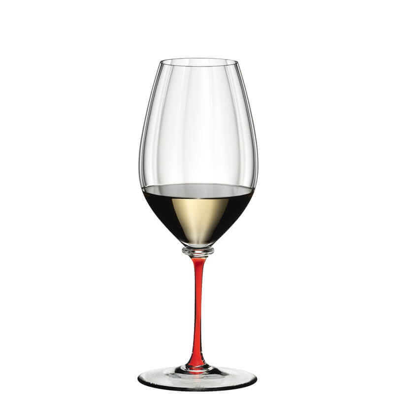 bicchiere di vetro trasparente con calice ampio, stelo sottile rosso e base tonda, contenente vino bianco fino a metà