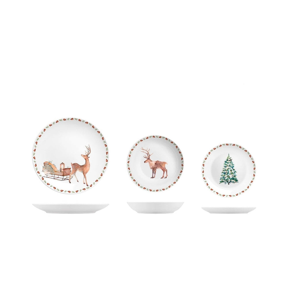 Piatti bianchi con decorazioni natalizie, 2 renne e un albero di natale
